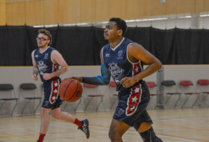 Two players playing Basketball